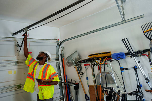 Professional Garage Door Panel Replacement technician working in Puxico, MO